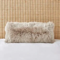 Dorma Natural Sheepskin Long Boudoir Cushion